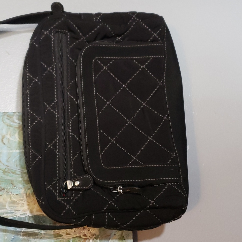 Vera Bradley black quilted bag, handbag with floral design inside of purse